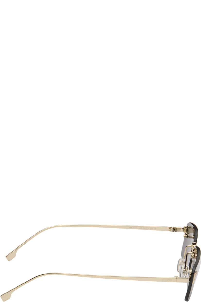 Rectangular rimless metal-frame sunglasses.

· Gray lenses 
· 100% UVA/UVB protection, category 3 
· Adjustable rubber nose pads
· Crystal-cut logo at face
· Logo engraved at temples
· Includes pouch
· Size: 54.16 135 

Supplier color: Gold/Smoke