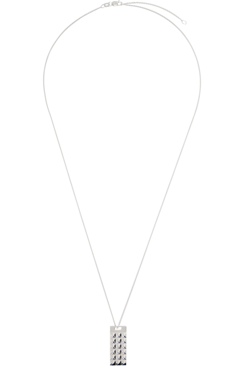 Cable chain necklace in sterling silver.

· Pyramid studs at sliding pendant 
· Lobster-clasp fastening 
· L24"

Supplier color: Silver