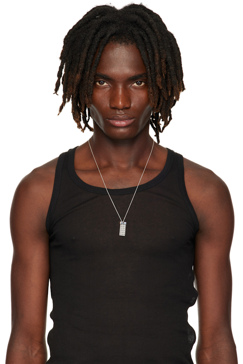 Cable chain necklace in sterling silver.

· Pyramid studs at sliding pendant 
· Lobster-clasp fastening 
· L24"

Supplier color: Silver