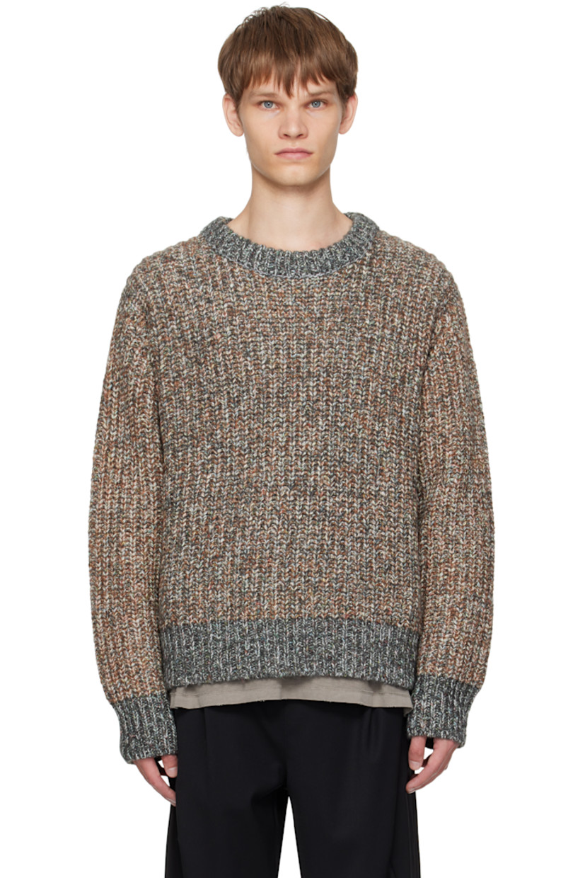 Rib-knit cotton-blend sweater.

· Marling throughout
· Crewneck
· Dropped shoulders

Supplier color: Melange taupe