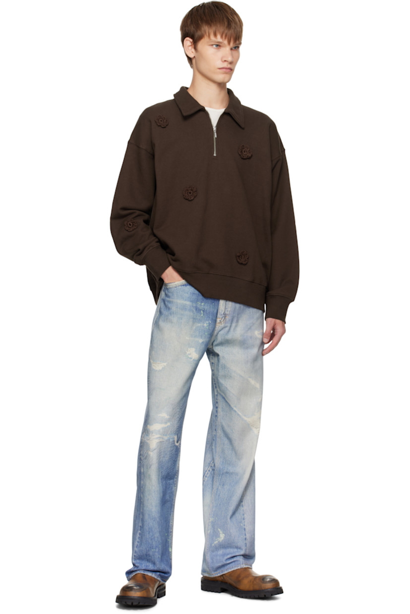 French terry sweatshirt.

· Floral appliqués throughout
· Spread collar
· Half-zip closure
· Rib-knit hem and cuffs
· Dropped shoulders

Supplier color: Brown