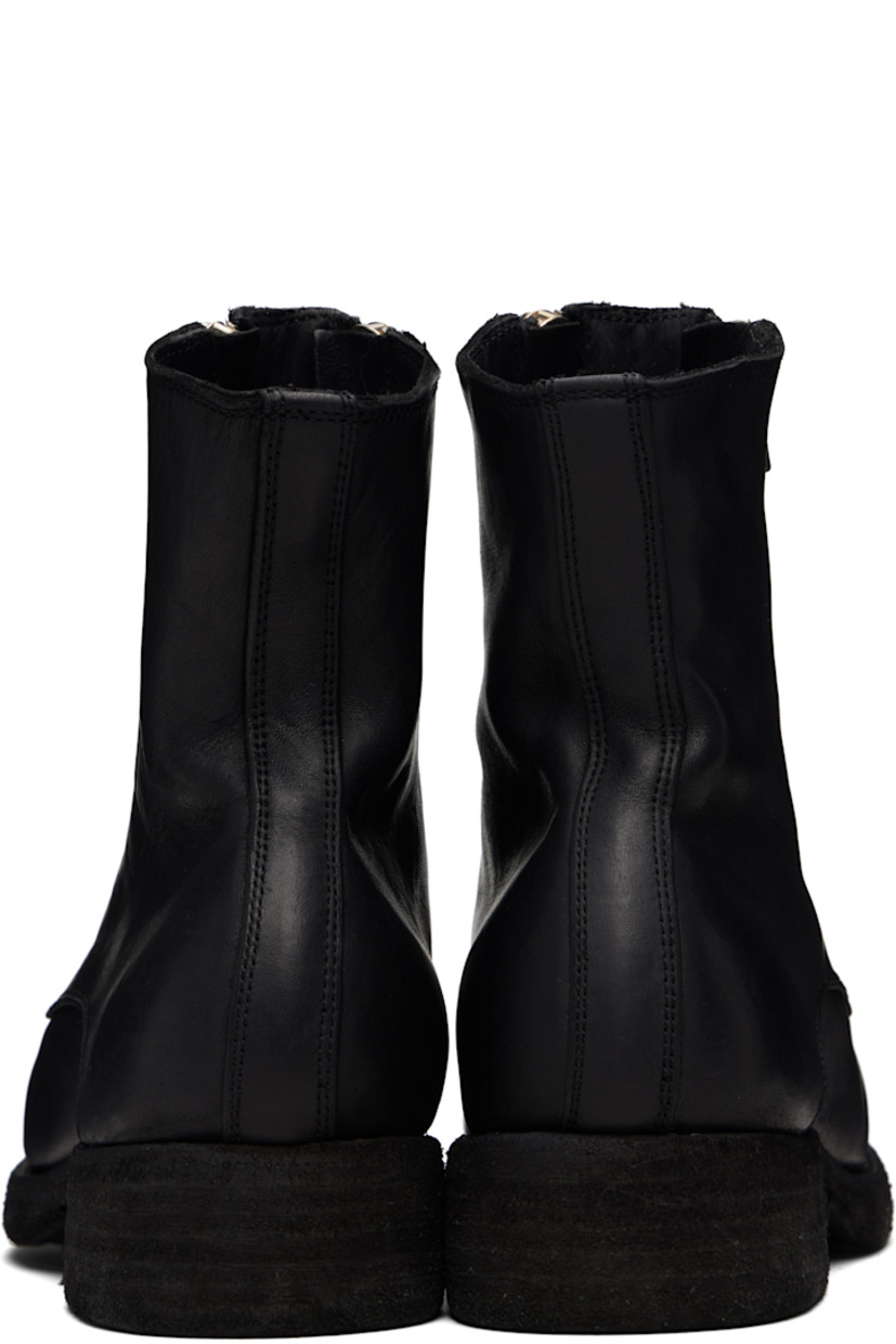 Ankle-high grained horse leather boots. 

· Twin zip closure at vamp
· Contrast stitching in white at welt 
· Rubber midsole 
· Leather sole 

Supplier color: Blkt