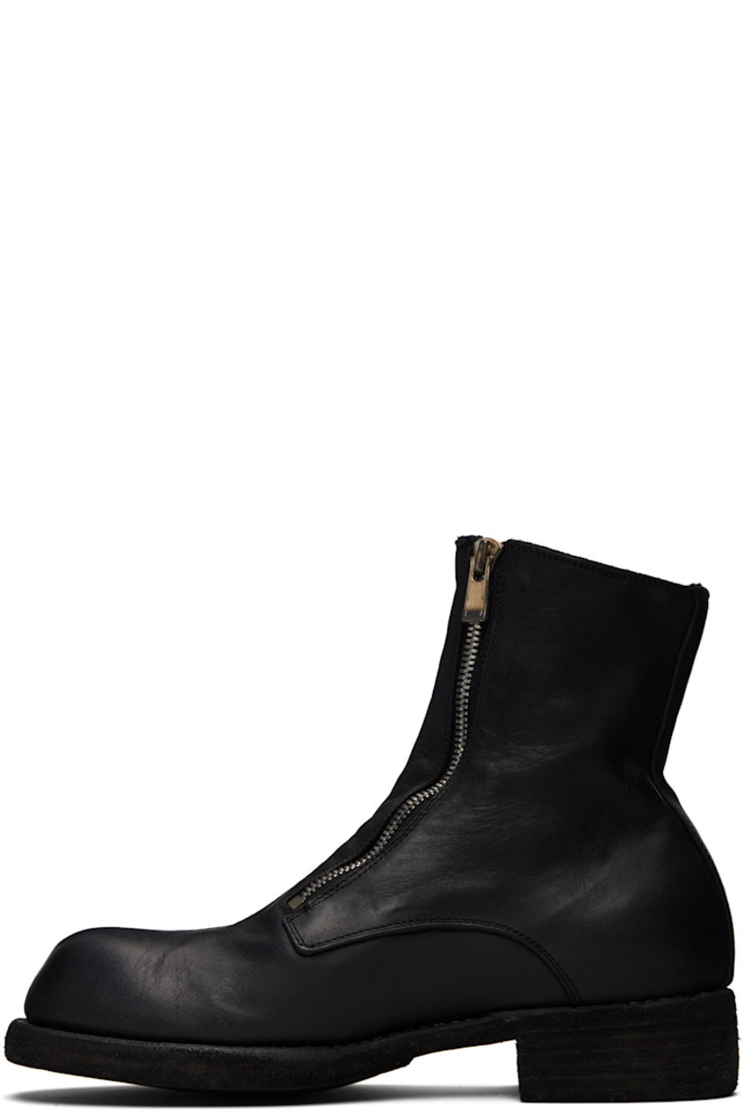 Ankle-high grained horse leather boots. 

· Twin zip closure at vamp
· Contrast stitching in white at welt 
· Rubber midsole 
· Leather sole 

Supplier color: Blkt