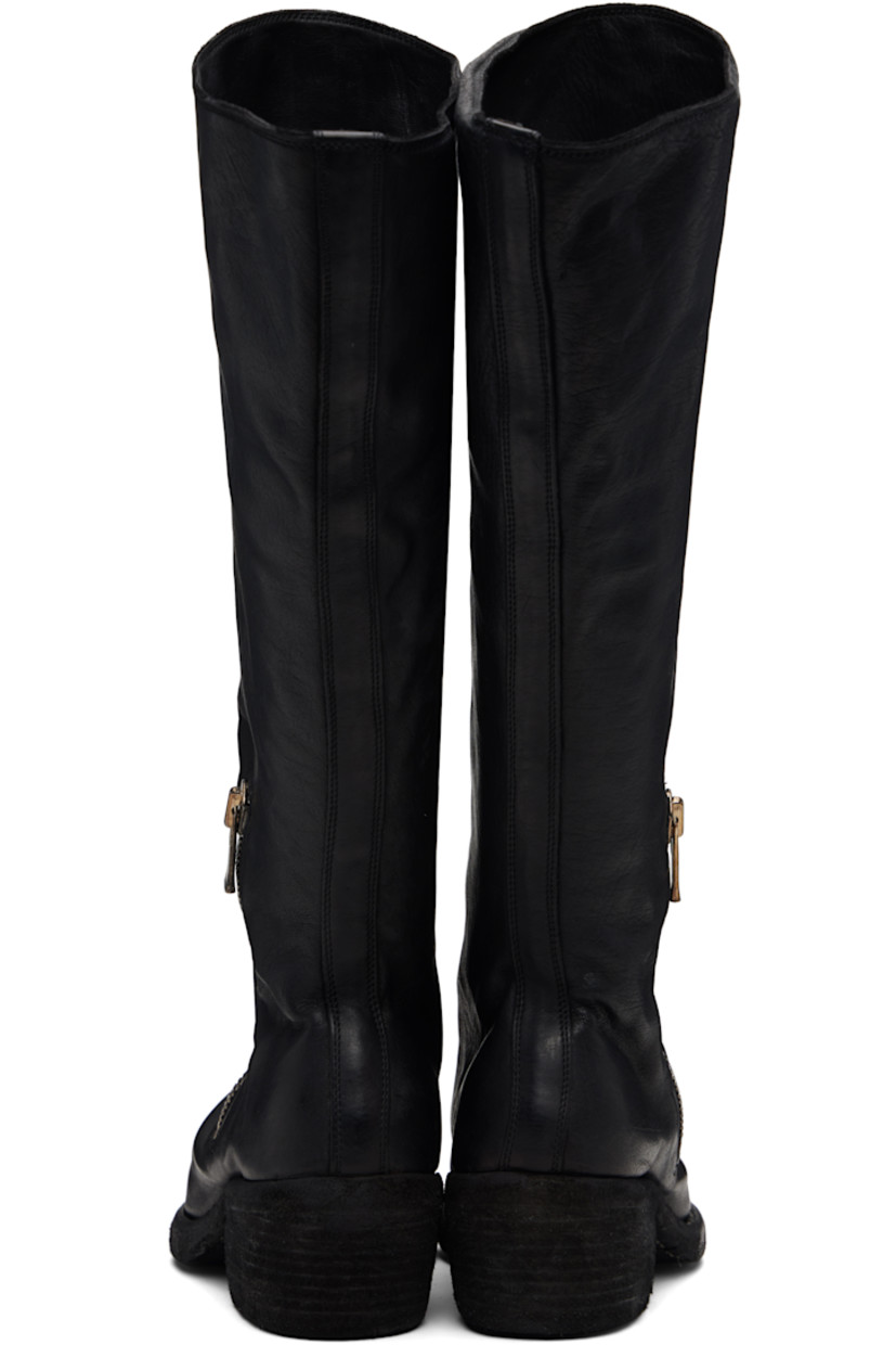 Knee-high grained horse leather boots. 

· Zip closure at vamp
· Contrast stitching in white at welt 
· Rubber midsole 
· Rubber block heel 
· Leather sole 
· Heel: H2"

Supplier color: Blkt