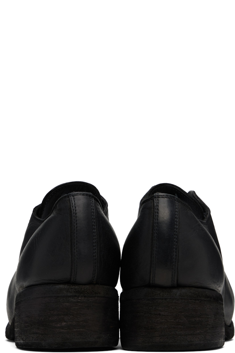 Buffed horse leather oxfords.

· Lace-up closure
· Topstitching at welt
· Stacked leather block heel
· Leather sole
· Heel: H1.75"

Supplier color: Blkt