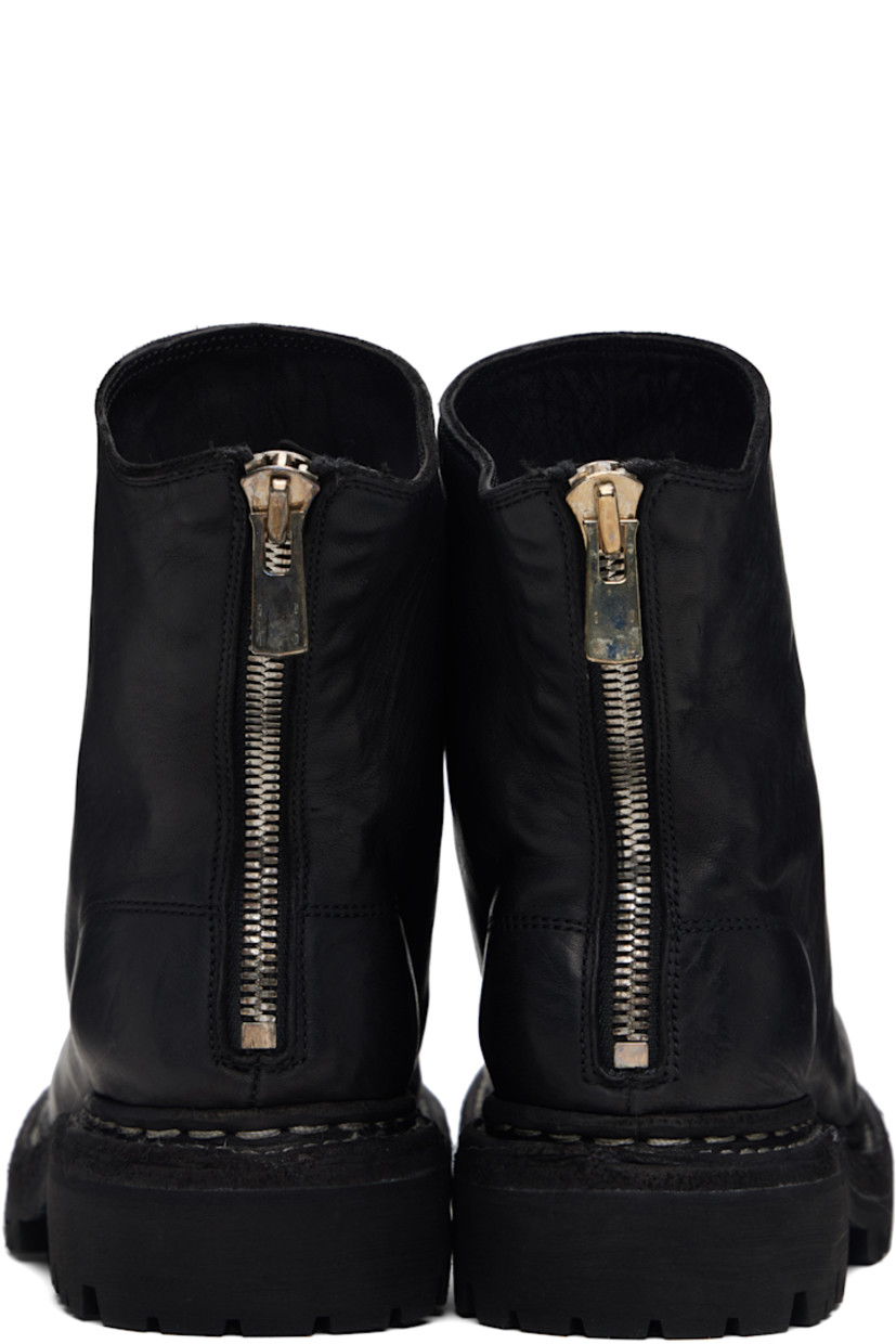 Ankle-high grained horse leather boots.

· Zip closure at heel counter 
· Contrast stitching in white at welt 
· Rubber midsole 
· Treaded Vibram® rubber sole

Supplier color: Blkt