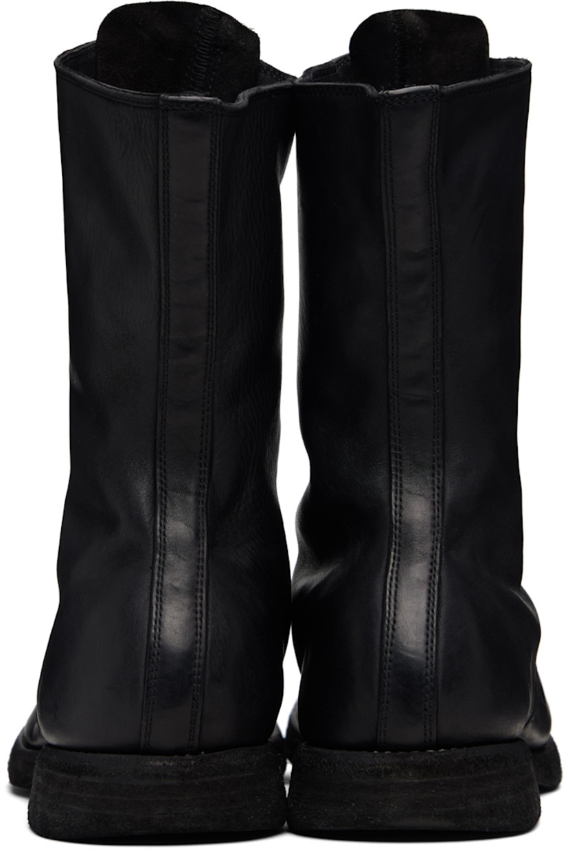 Ankle-high grained horse leather boots. 

· Zip closure at vamp
· Contrast stitching in white at welt 
· Rubber midsole 
· Leather sole 

Supplier color: Blkt