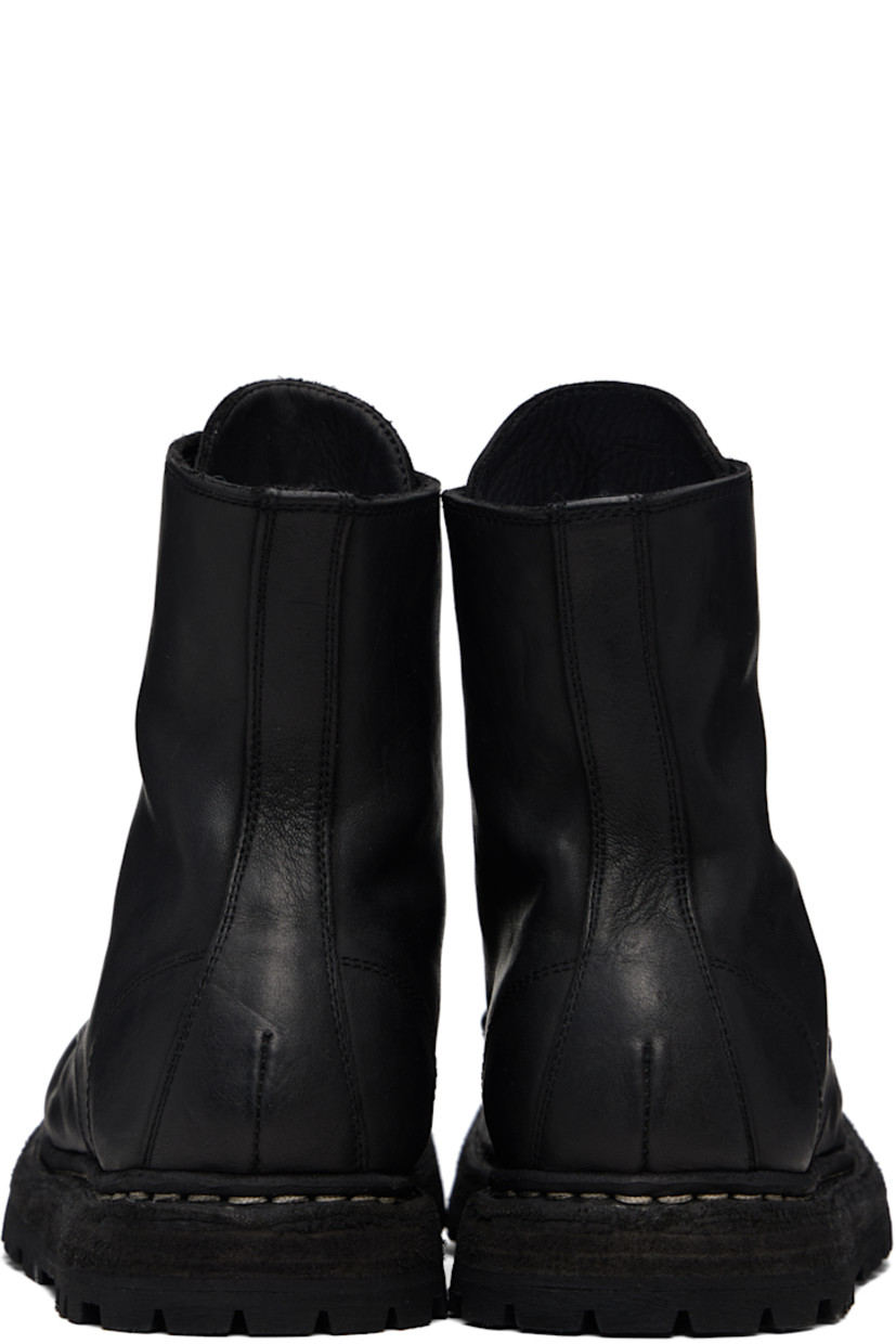 Ankle-high grained horse leather boots.

· Lace-up closure 
· Zip closure at heel 
· Contrast stitching in white at welt 
· Rubber midsole 
· Treaded Vibram® rubber sole

Supplier color: Blkt