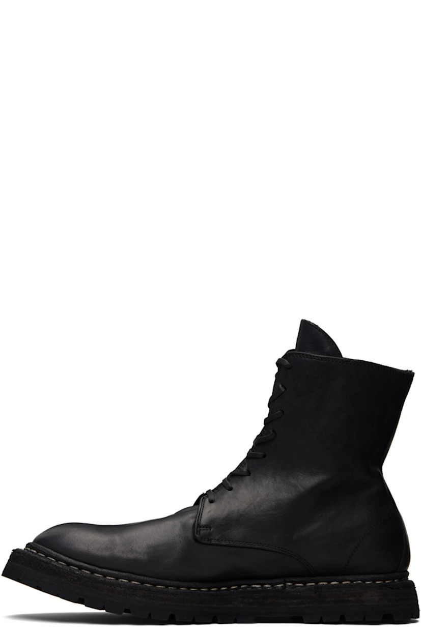 Ankle-high grained horse leather boots.

· Lace-up closure 
· Zip closure at heel 
· Contrast stitching in white at welt 
· Rubber midsole 
· Treaded Vibram® rubber sole

Supplier color: Blkt