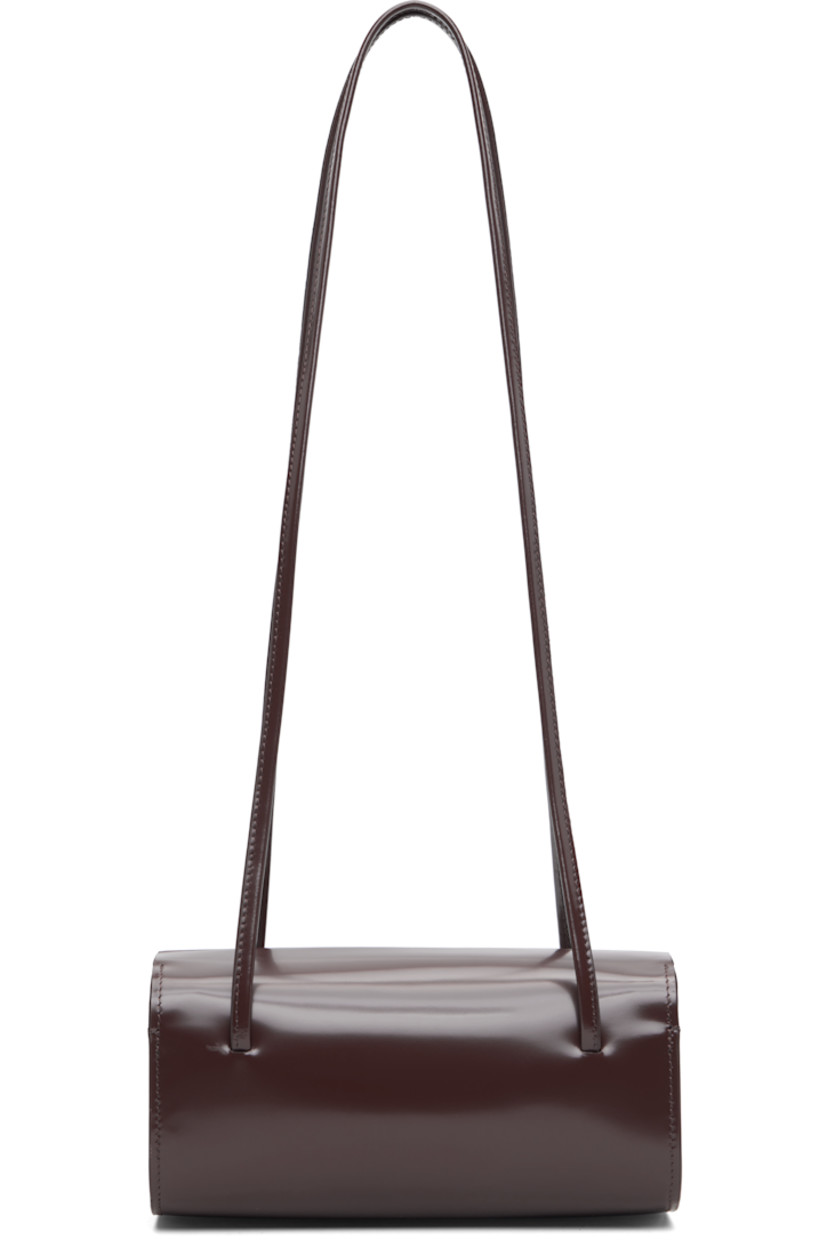 Spazzolato calfskin shoulder bag.

· Twin shoulder straps
· Magnetic closure
· Twill lining
· H3.75" x W7.75" x D3.5"

Supplier color: Choc spazzolato