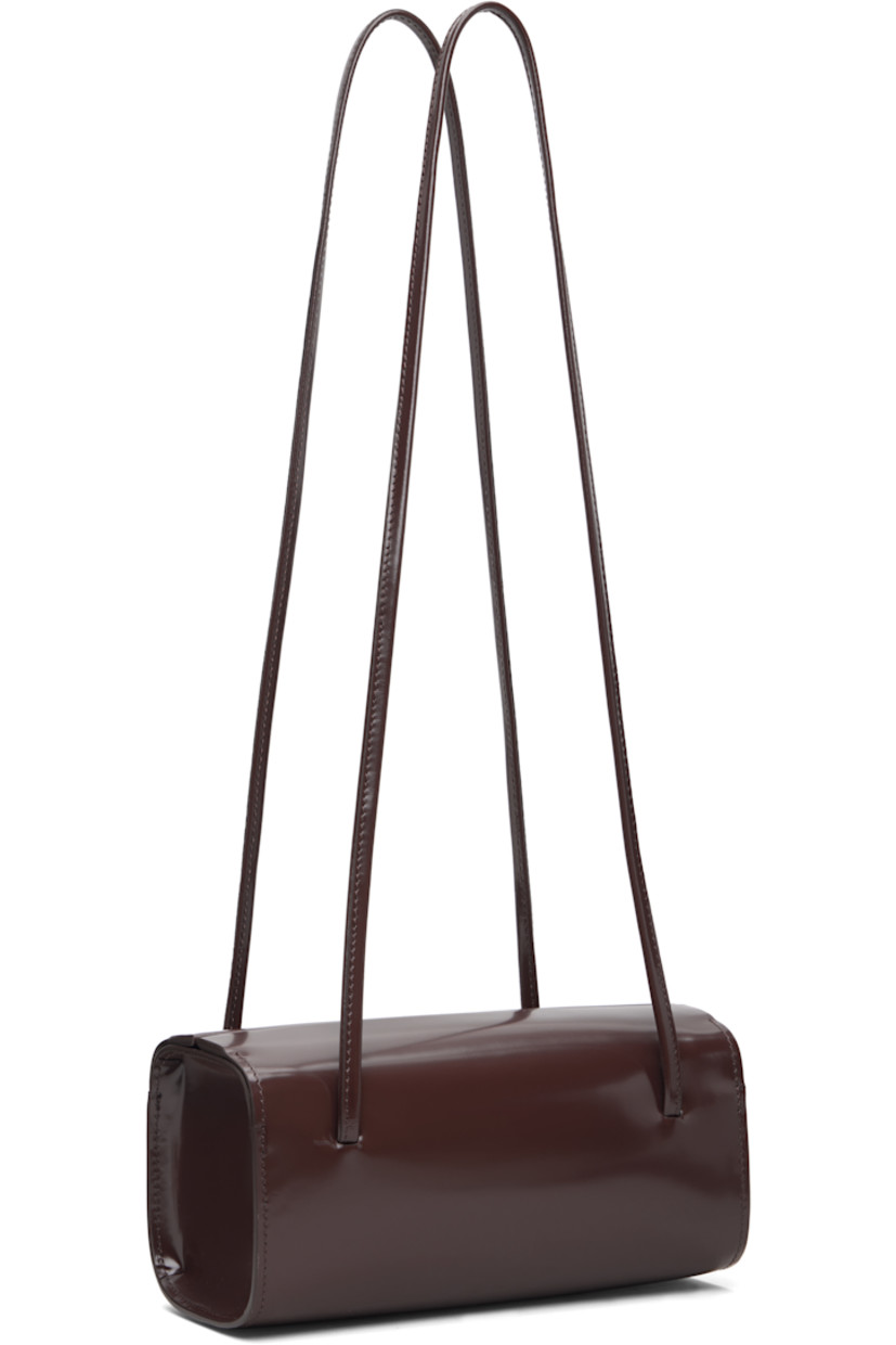Spazzolato calfskin shoulder bag.

· Twin shoulder straps
· Magnetic closure
· Twill lining
· H3.75" x W7.75" x D3.5"

Supplier color: Choc spazzolato