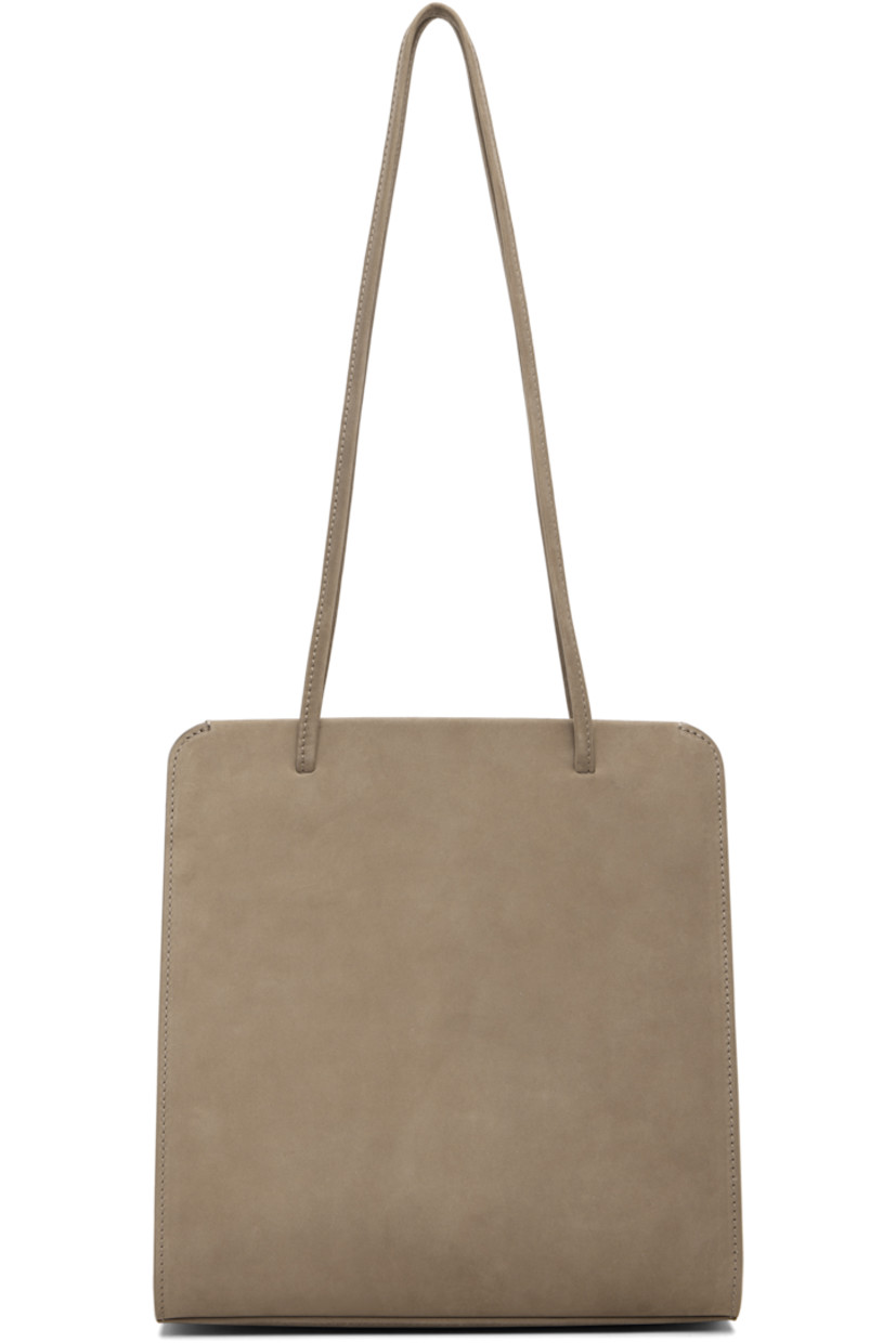 Nubuck shoulder bag.

· Twin shoulder straps
· Patch pocket at back face
· Accordion panel at sides
· Magnetic closure
· Patch pocket at interior
· Twill lining
· H9.75" x W9.25" x D2.75"

Supplier color: Biche nubuck