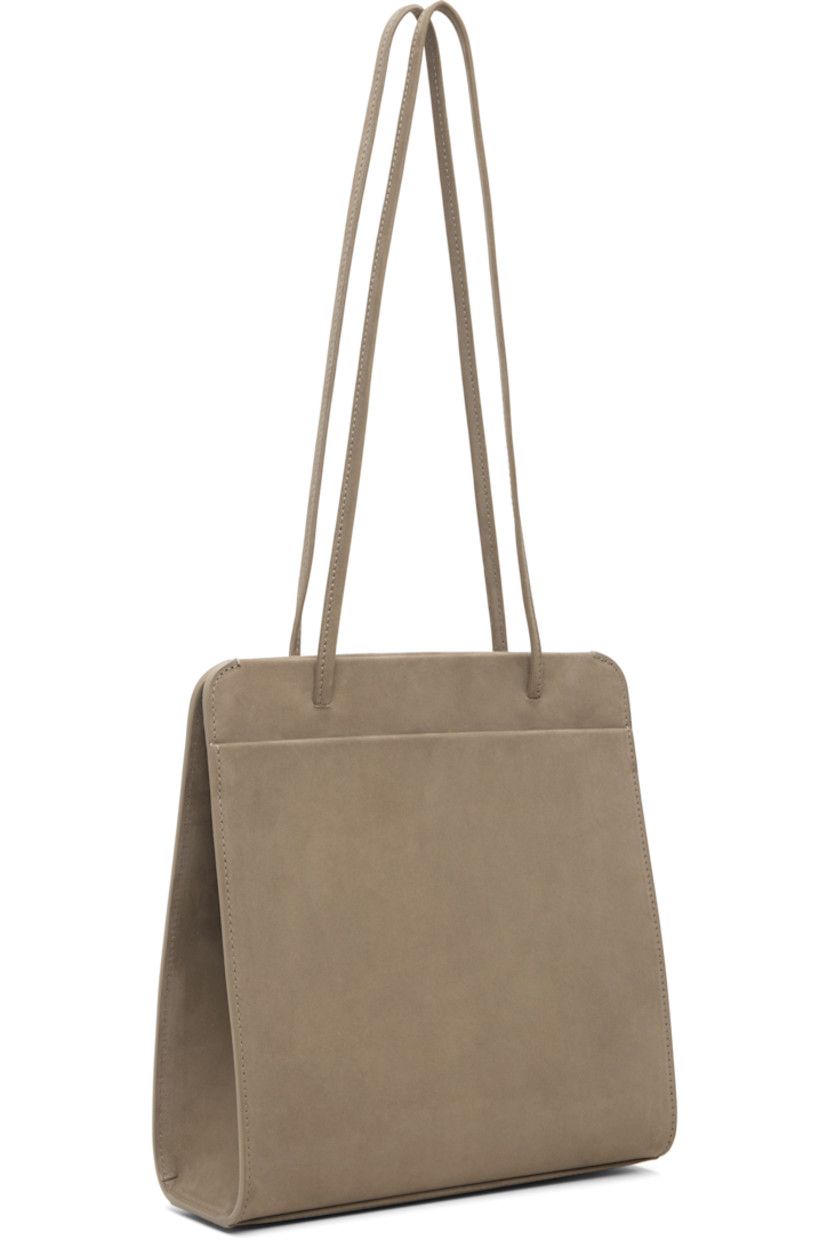 Nubuck shoulder bag.

· Twin shoulder straps
· Patch pocket at back face
· Accordion panel at sides
· Magnetic closure
· Patch pocket at interior
· Twill lining
· H9.75" x W9.25" x D2.75"

Supplier color: Biche nubuck