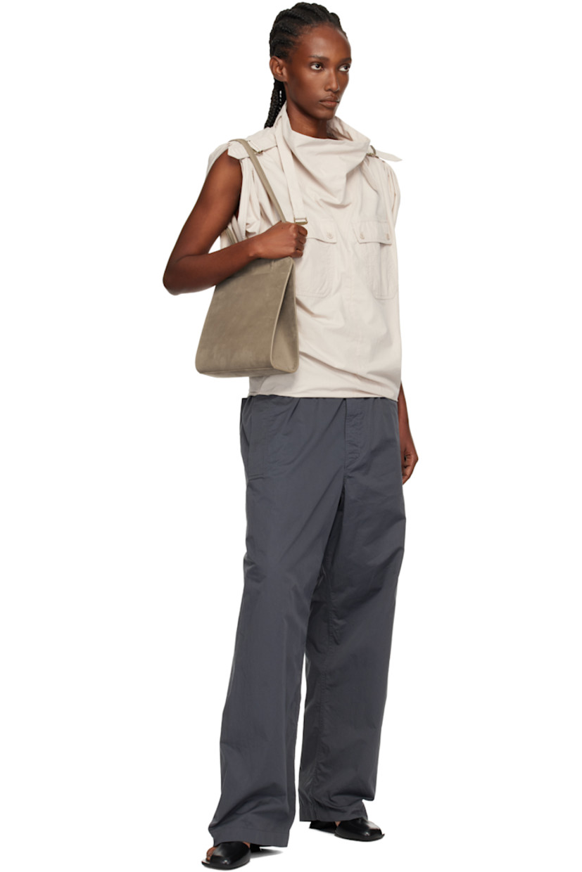 Nubuck shoulder bag.

· Twin shoulder straps
· Patch pocket at back face
· Accordion panel at sides
· Magnetic closure
· Patch pocket at interior
· Twill lining
· H9.75" x W9.25" x D2.75"

Supplier color: Biche nubuck