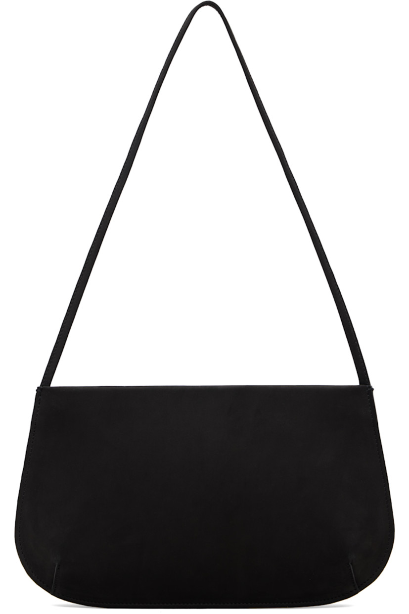 Nubuck shoulder bag.

· Fixed shoulder strap
· Darts at base
· Magnetic closure
· Patch pocket at interior
· Twill lining
· H6" x W11" x D2.25"

Supplier color: Noir nubuck