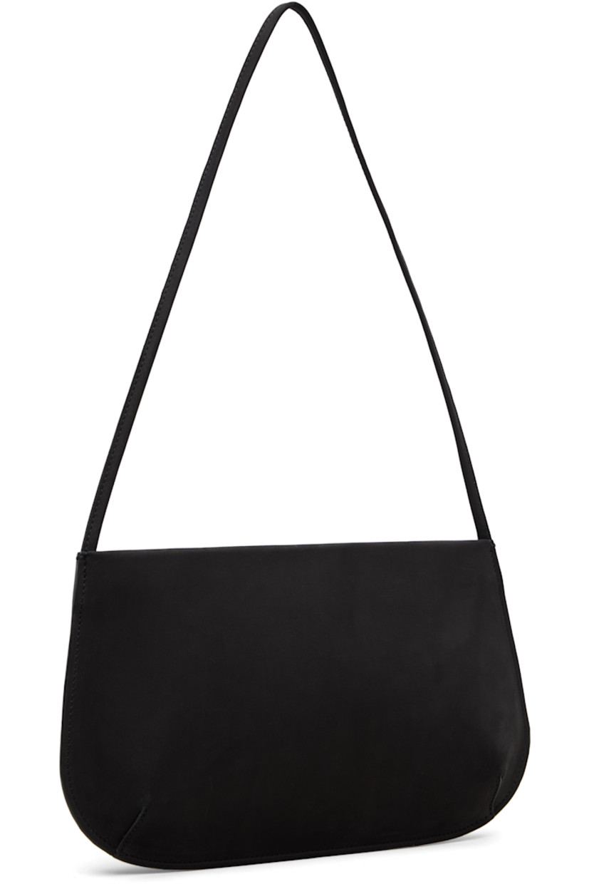 Nubuck shoulder bag.

· Fixed shoulder strap
· Darts at base
· Magnetic closure
· Patch pocket at interior
· Twill lining
· H6" x W11" x D2.25"

Supplier color: Noir nubuck