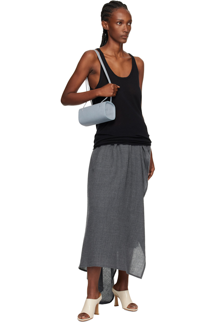 Nubuck shoulder bag.

· Twin shoulder straps
· Magnetic closure
· Twill lining
· H3.75" x W7.75" x D3.5"

Available exclusively at SSENSE.

Supplier color: Blue grey nubuck