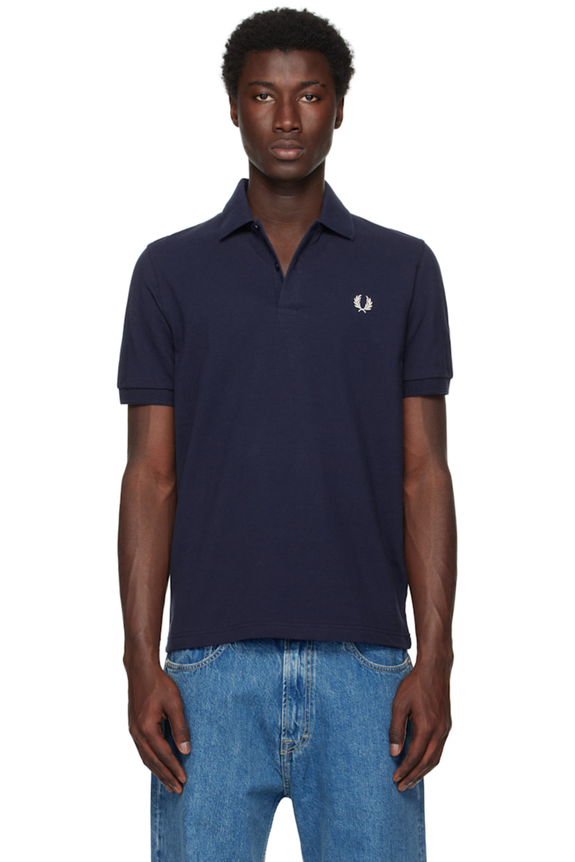 Cotton piqué polo.

· Rib-knit spread collar and cuffs
· Two-button placket
· Logo embroidered at chest 

Supplier color: Navy/Ice