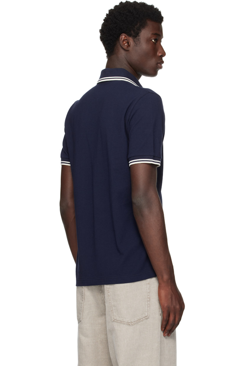 Cotton piqué polo.

· Striped rib-knit spread collar and cuffs
· Two-button placket 
· Logo embroidered at chest

Supplier color: Dark Carbon/Ecru/Ecru