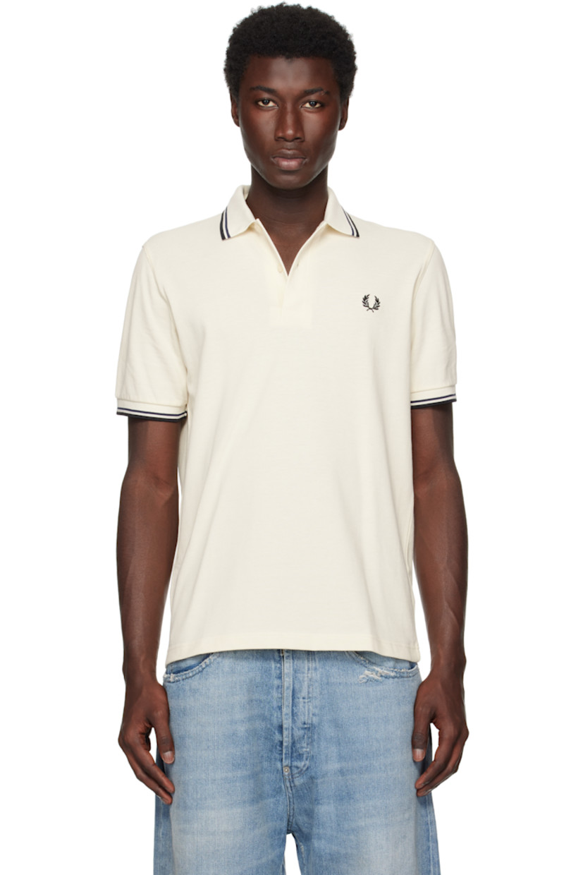 Cotton piqué polo.

· Striped rib-knit spread collar and cuffs
· Two-button placket 
· Logo embroidered at chest 
 
Supplier color: Ecru/Tennis Blue/Black