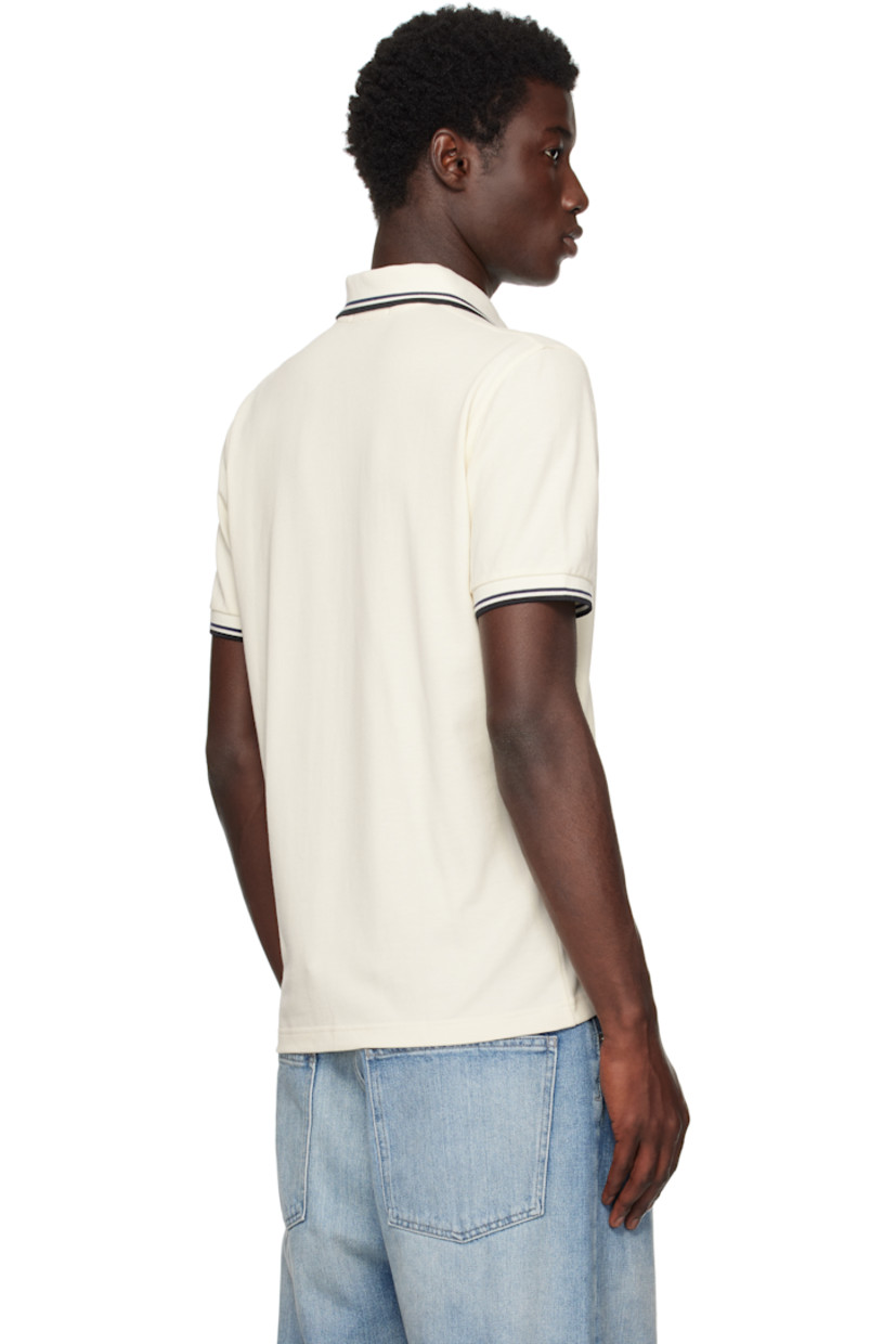 Cotton piqué polo.

· Striped rib-knit spread collar and cuffs
· Two-button placket 
· Logo embroidered at chest 
 
Supplier color: Ecru/Tennis Blue/Black