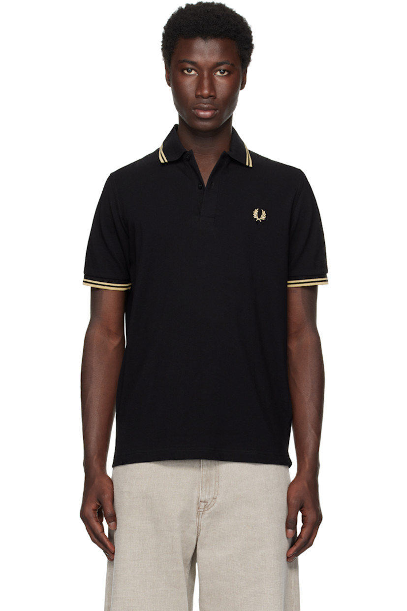 Cotton piqué polo.

· Striped rib-knit spread collar and cuffs
· Two-button placket 
· Logo embroidered at chest

Supplier color: Black/Champagne