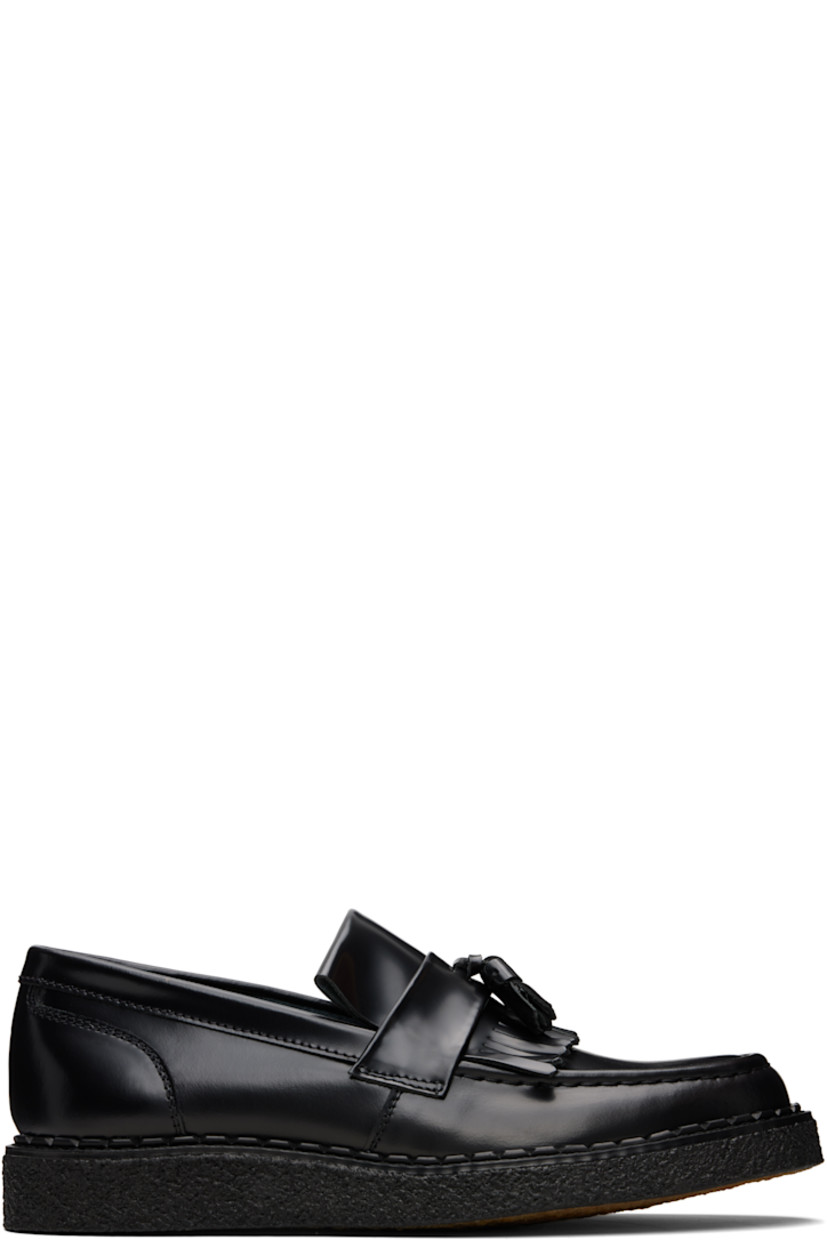 Polished leather loafers.

· Moc toe
· Tassels and fringed trim at vamp
· Suede lining
· Crêpe rubber sole

Part of the Fred Perry x George Cox collaboration.

Supplier color: Black