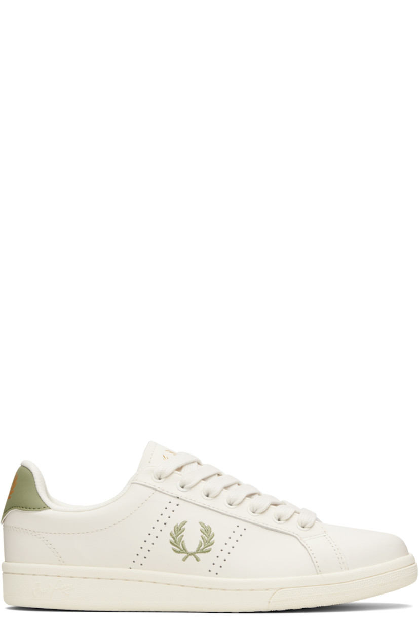 Low-top buffed leather sneakers.

· Lace-up closure
· Logo printed at padded tongue and heel tab
· Padded collar
· Perforations at sides
· Logo embroidered at outer side
· Mesh lining
· Treaded rubber sole

Supplier color: Light ecru