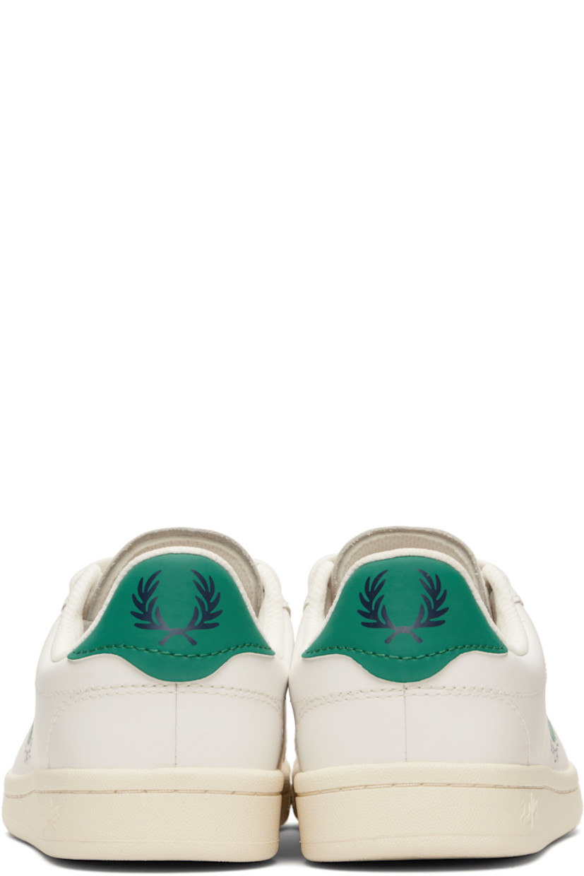 Low-top buffed leather sneakers.

· Lace-up closure
· Logo printed at padded tongue 
· Padded collar
· Logo graphic at outer side and heel tab
· Faux-leather heel tab
· Mesh lining
· Treaded rubber sole

Supplier color: Snow white