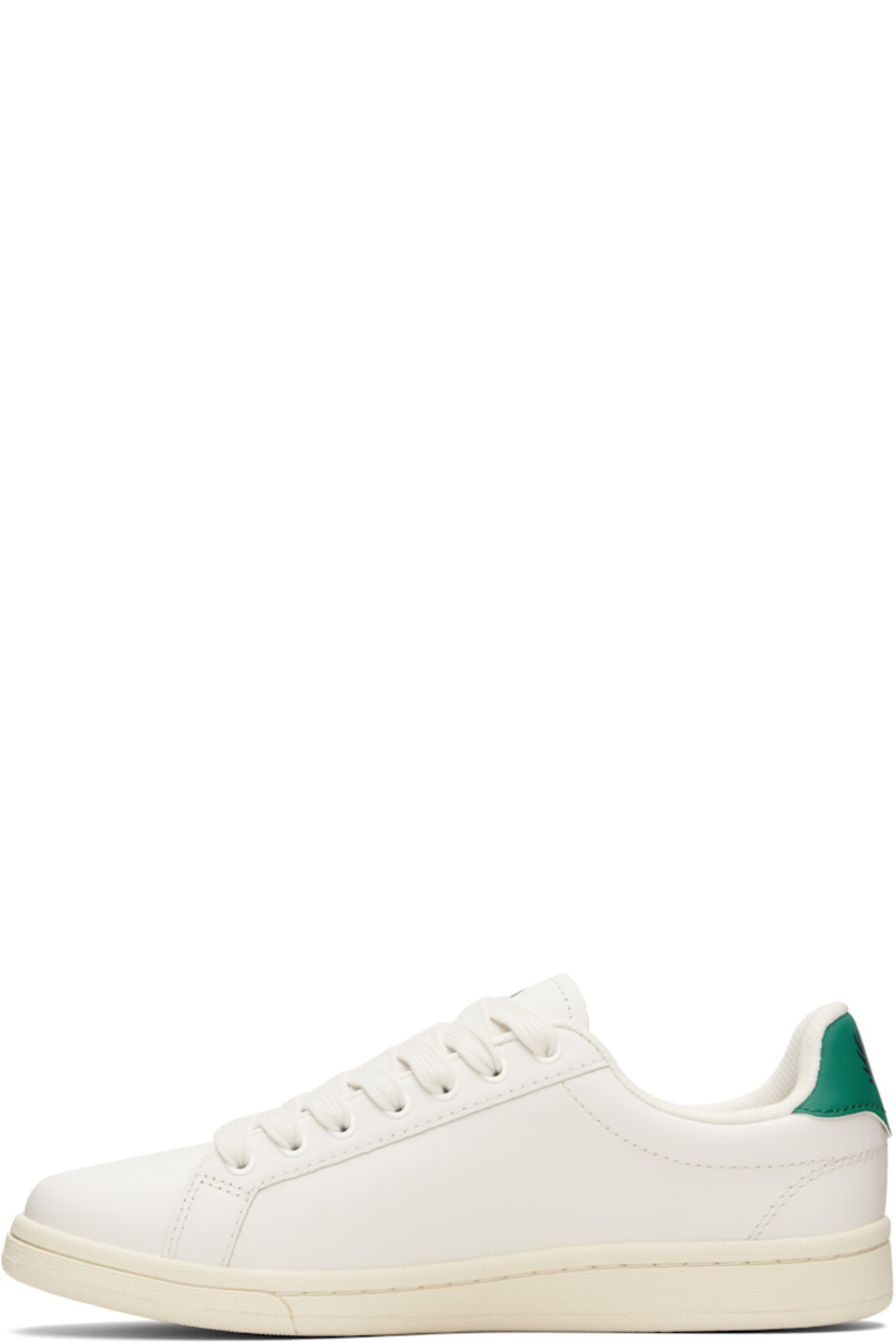 Low-top buffed leather sneakers.

· Lace-up closure
· Logo printed at padded tongue 
· Padded collar
· Logo graphic at outer side and heel tab
· Faux-leather heel tab
· Mesh lining
· Treaded rubber sole

Supplier color: Snow white