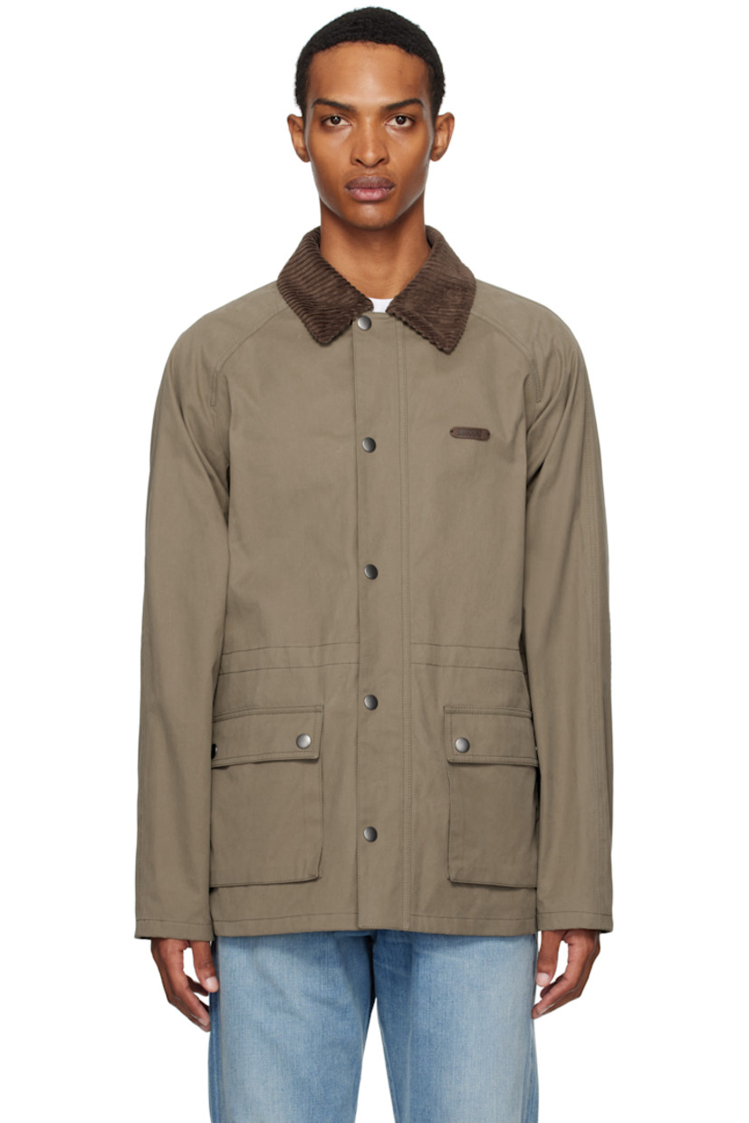 Cotton twill jacket.

· Spread collar
· Button closure
· Leather logo patch at chest
· Flap and seam pockets at front
· Drawstrings at interior waist
· Full flannel lining

Supplier color: Multi Green