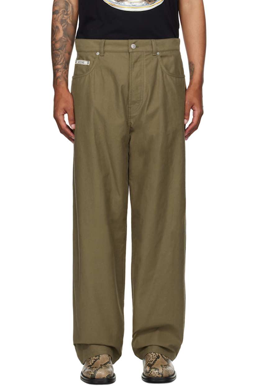 Cotton plain-woven cargo pants.

· Belt loops
· Five-pocket styling
· Button fly
· Logo patch at coin pocket
· Cargo pocket at outseams

Supplier color: Green