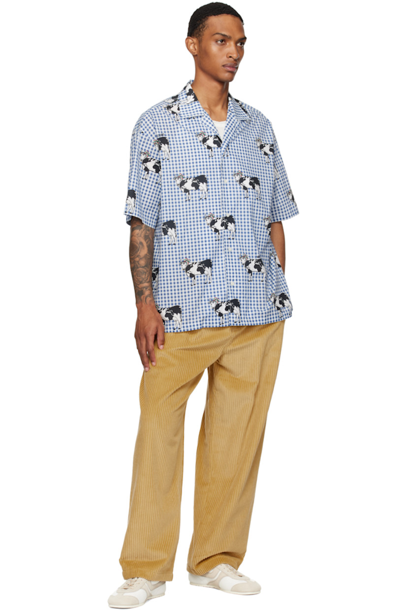 Cotton corduroy trousers.

· Belt loops
· Four-pocket styling
· Zip fly
· Pleats at front
· Logo patch at back waistband

Supplier color: Yellow