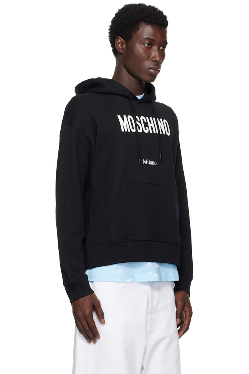 Organic cotton jersey hoodie.

· Drawstring at hood
· Logo and text printed at chest
· Kangaroo pocket
· Rib-knit cuffs and hem
· Dropped shoulders

Supplier color: Multi Black