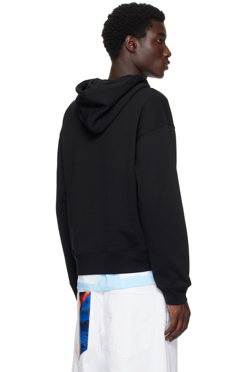 Organic cotton jersey hoodie.

· Drawstring at hood
· Logo and text printed at chest
· Kangaroo pocket
· Rib-knit cuffs and hem
· Dropped shoulders

Supplier color: Multi Black