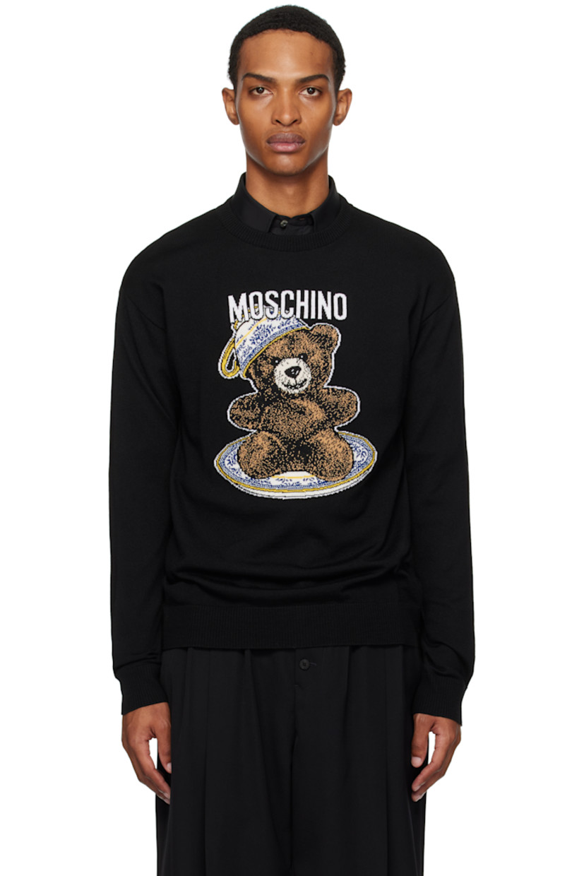 Knit virgin-wool sweater.

· Rib-knit crewneck, hem, and cuffs
· Intarsia logo graphic at front

Supplier color: Multi Black