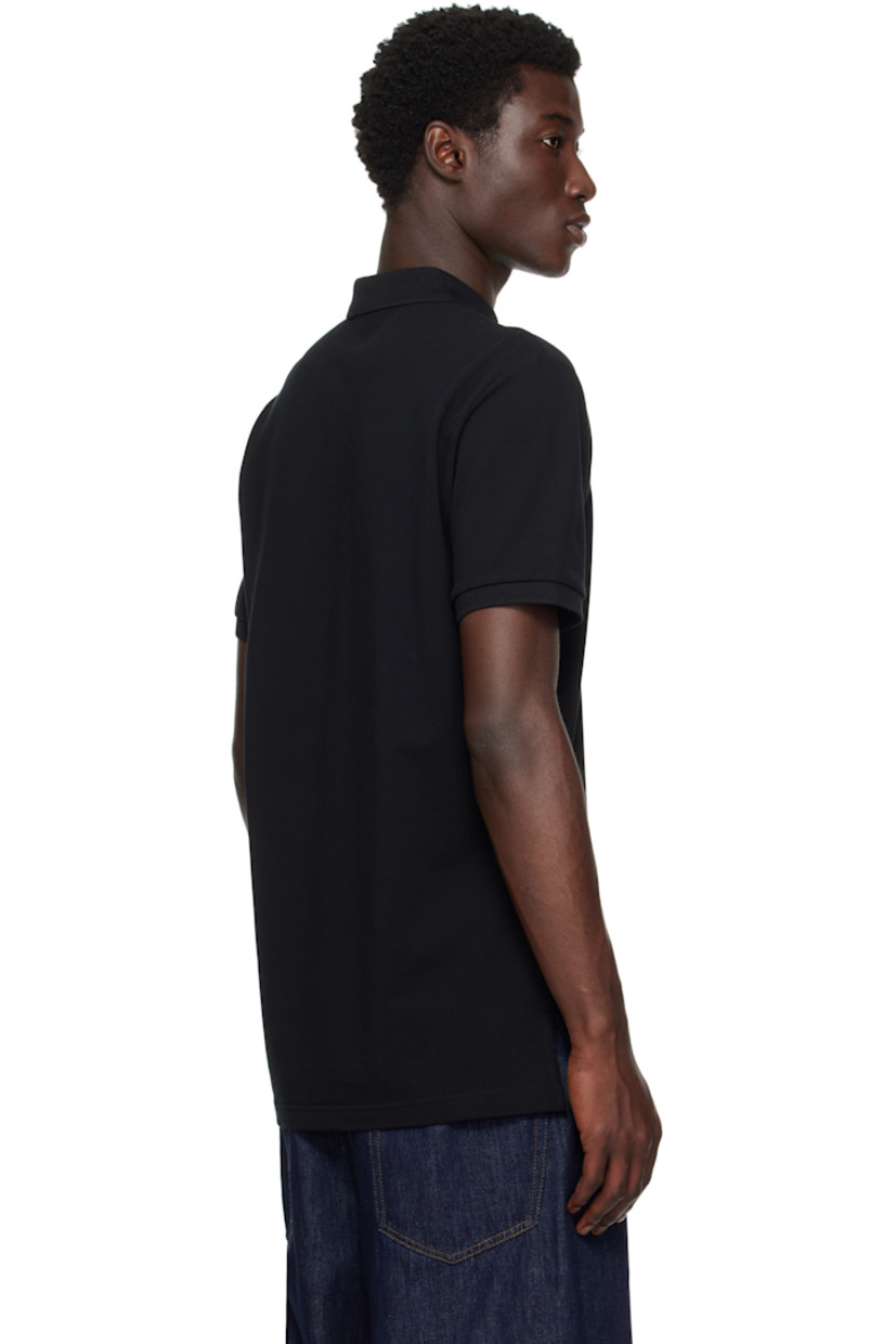 Cotton piqué polo.

· Rib-knit spread collar and cuffs
· Three-button placket
· Logo and graphic printed at chest
· Tennis-tail hem

Supplier color: Multi Black