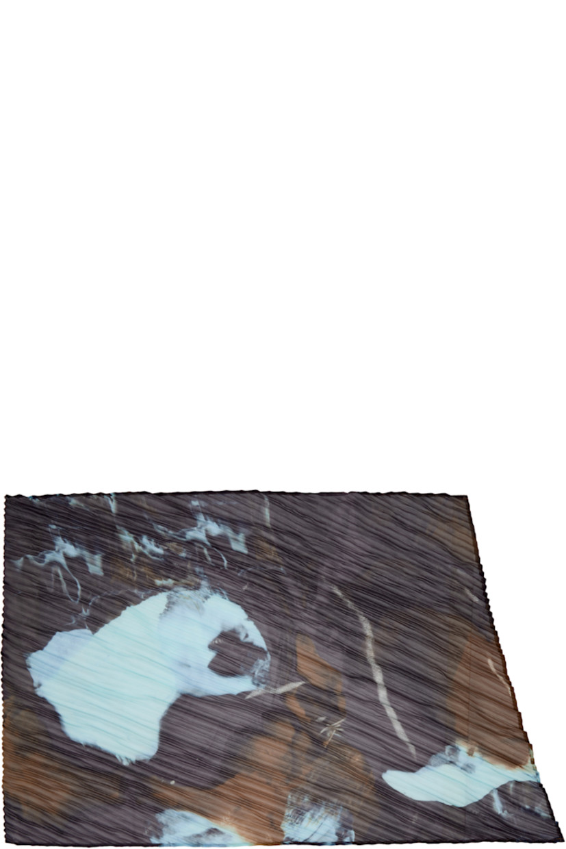 Rectangular garment-pleated and semi-sheer voile scarf.

· Graphic pattern printed throughout
· L64" x W18"

Supplier color: Brown