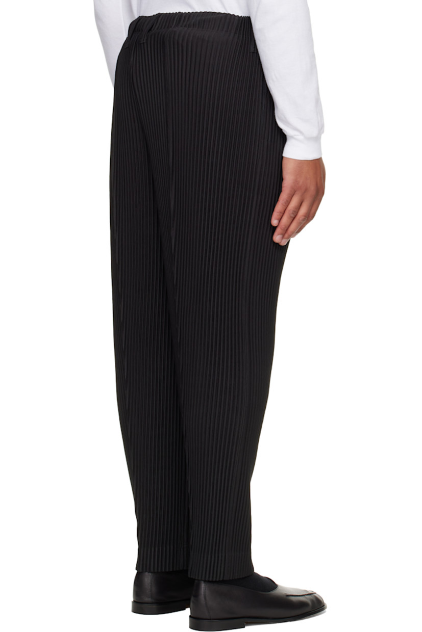 Garment-pleated tricot trousers.

· Belt loops at elasticized waistband
· Two-pocket styling 
· Button fly

Supplier color: Coke gray
