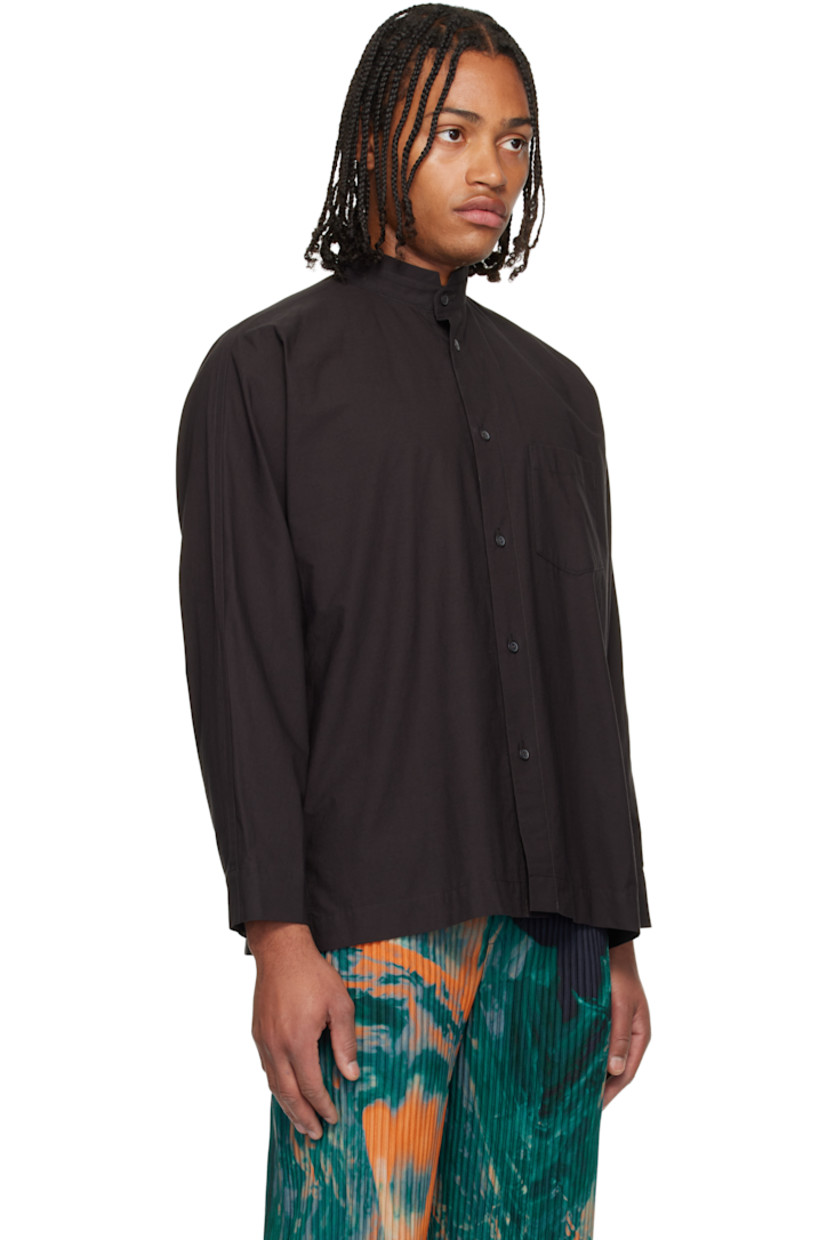 Semi-sheer crinkled organic cotton poplin shirt. 

· Band collar 
· Button closure 
· Patch pocket at chest
· Vented side seams
· Buttoned barrel cuffs
· Box pleat at back yoke 

Supplier color: Dark brown