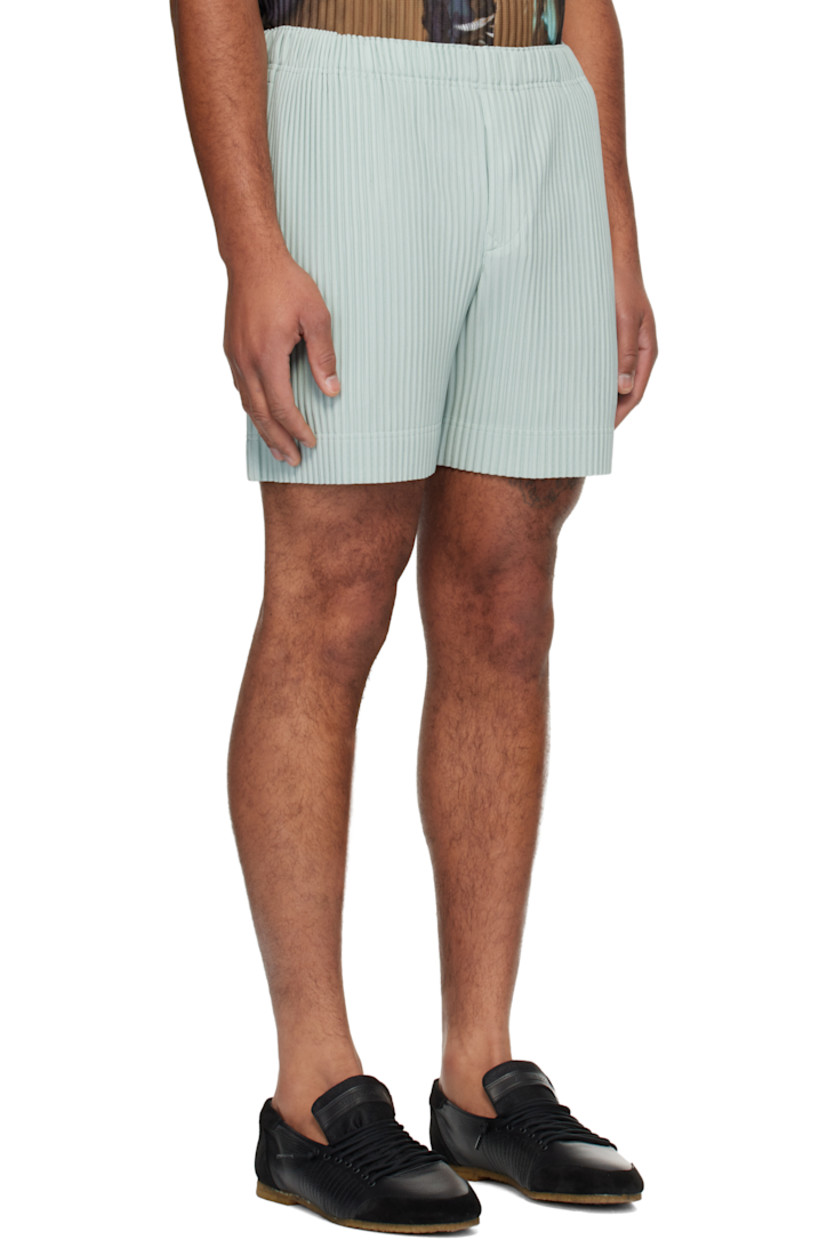 Garment-pleated polyester tricot shorts.

· Concealed drawstring at elasticized waistband
· Two-pocket styling
· Button fly 

Supplier color: Sercite blue