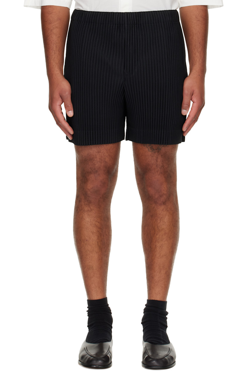 Garment-pleated tricot shorts.

· Elasticized waistband
· Two-pocket styling 
· Button fly

Supplier color: Black