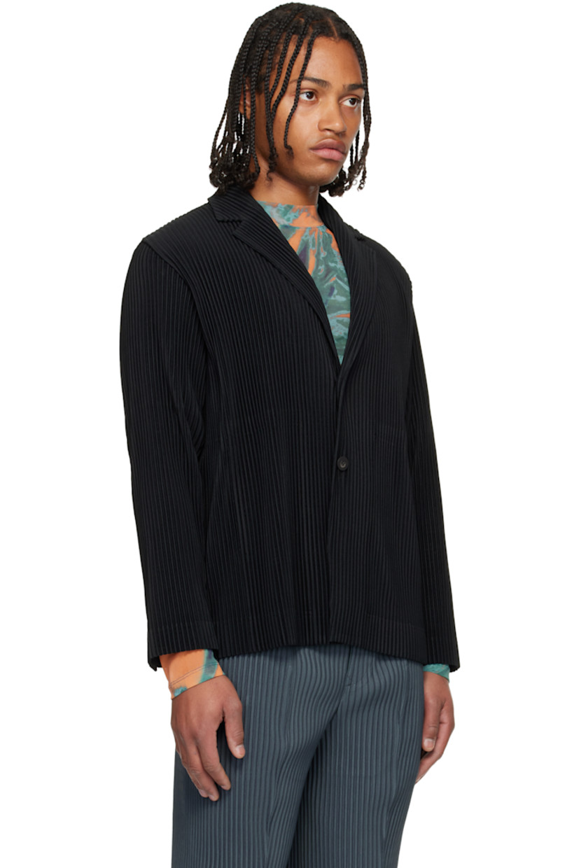 Garment-pleated polyester tricot blazer. 

· Notched lapel 
· Button closure 
· Buttoned barrel cuffs
· Central vent at back hem 

Supplier color: Black