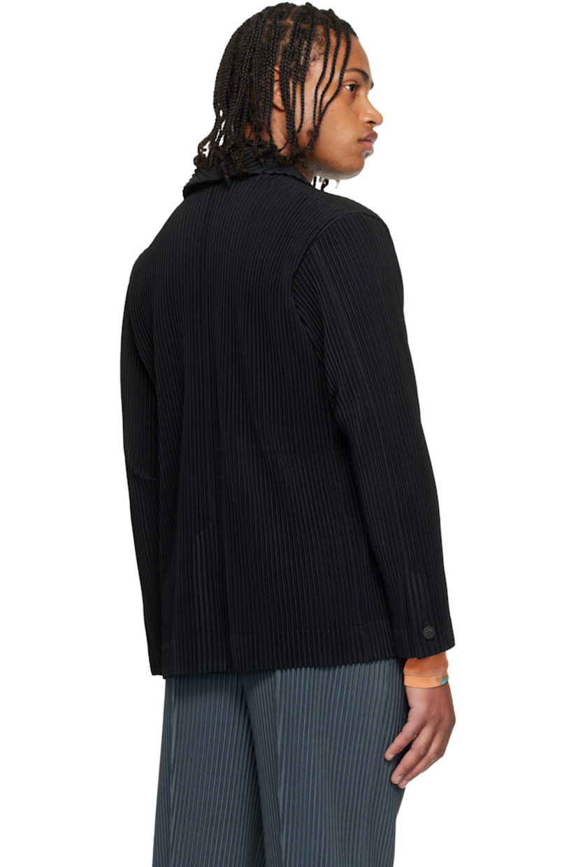 Garment-pleated polyester tricot blazer. 

· Notched lapel 
· Button closure 
· Buttoned barrel cuffs
· Central vent at back hem 

Supplier color: Black