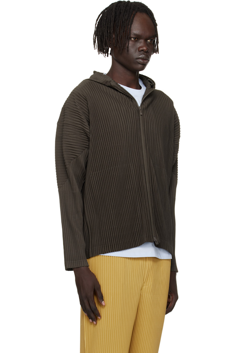 Lightweight garment-pleated tricot hoodie. 

· Quick-drying
· Bungee-style drawstring at hood
· Two-way zip closure
· Seam pockets
· Dolman sleeves

Supplier color: Mud brown