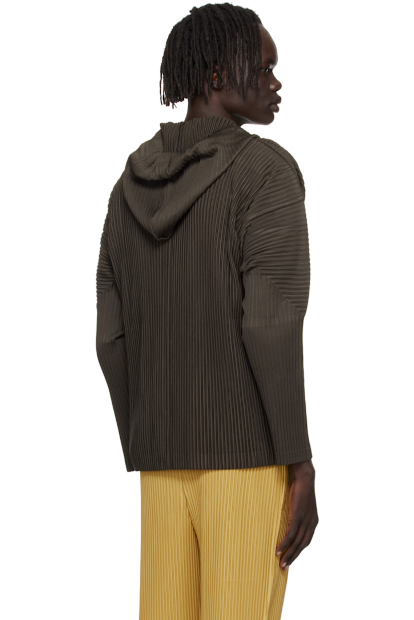 Lightweight garment-pleated tricot hoodie. 

· Quick-drying
· Bungee-style drawstring at hood
· Two-way zip closure
· Seam pockets
· Dolman sleeves

Supplier color: Mud brown