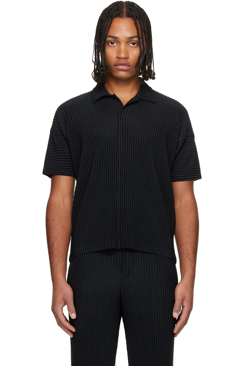 Garment-pleated polyester tricot polo.

· Quick-drying 
· Open spread collar 

Supplier color: Black