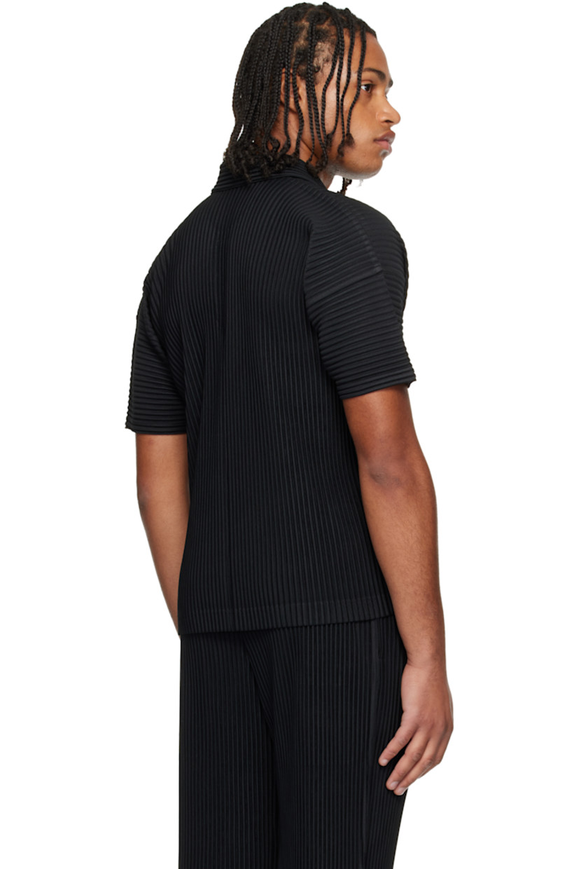 Garment-pleated polyester tricot polo.

· Quick-drying 
· Open spread collar 

Supplier color: Black
