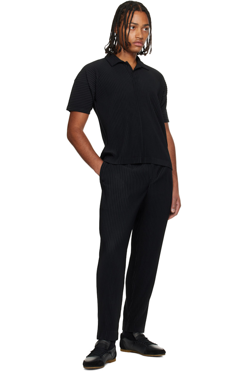 Garment-pleated polyester tricot polo.

· Quick-drying 
· Open spread collar 

Supplier color: Black