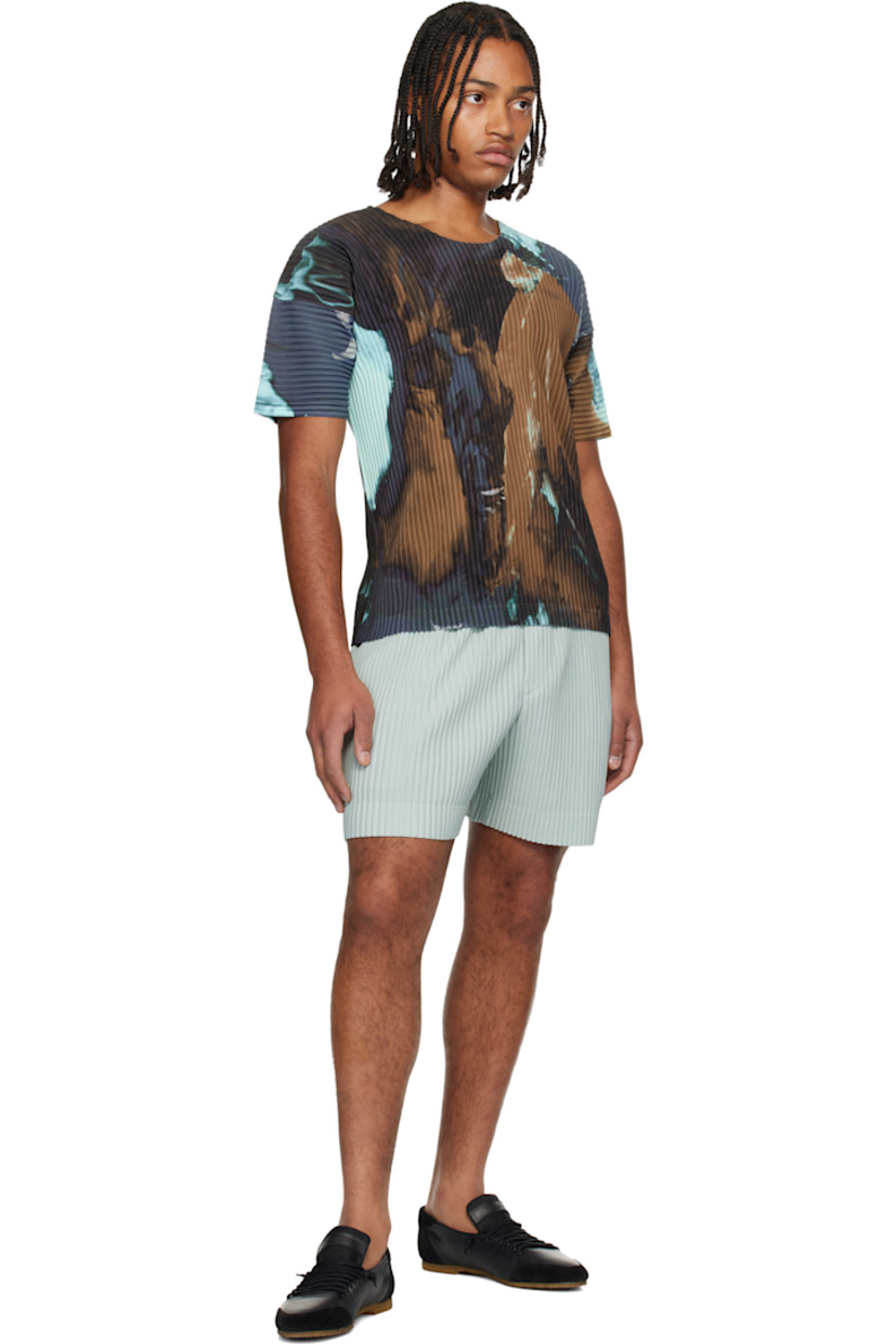 Garment-pleated polyester tricot T-shirt. 

· Graphic pattern printed throughout 
· Round neck

Supplier color: Brown